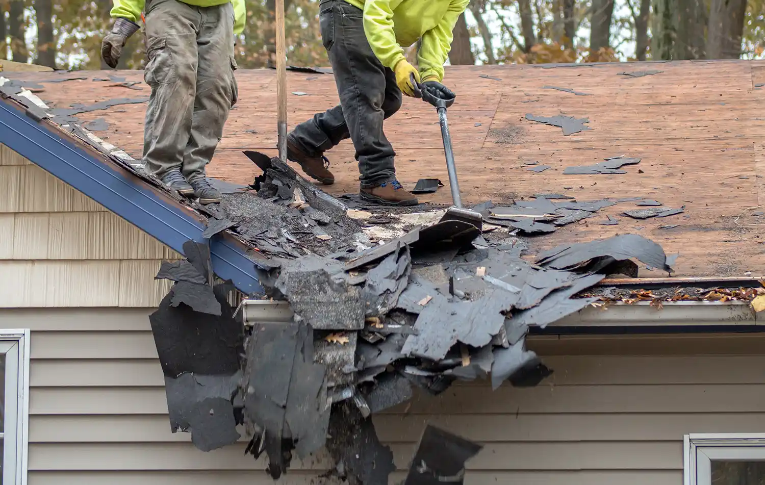 Roofer removing old shingles in Vancouver Washington